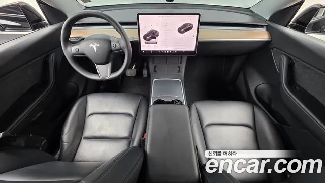 Tesla Model Y — Фото автомобиля 7