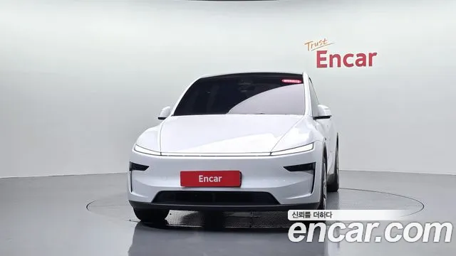 Tesla Model Y — Фото автомобиля 3