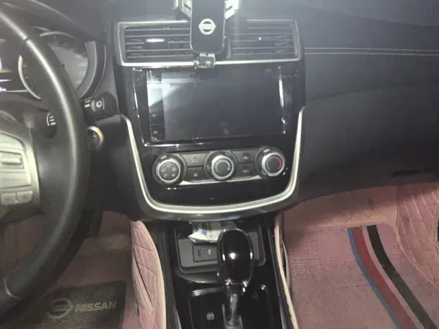 Nissan Tiida — Фото автомобиля 13