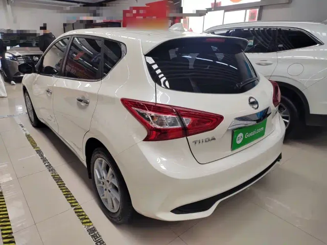Nissan Tiida — Фото автомобиля 22