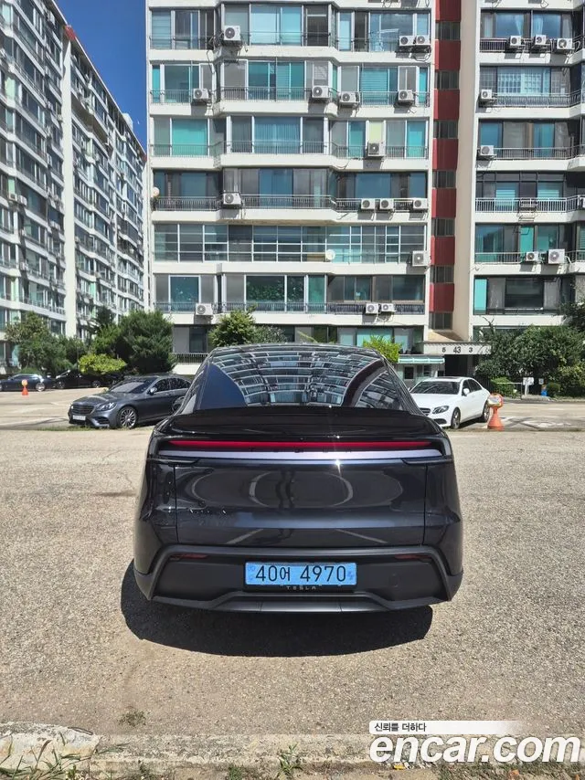 Tesla Model Y — Фото автомобиля 5