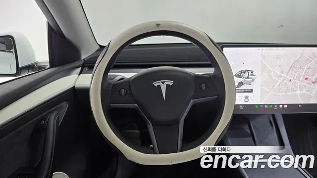 Tesla Model Y — Фото автомобиля 12
