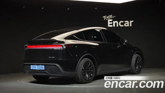Tesla Model Y — Фото автомобиля 2
