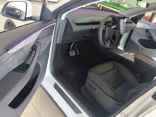 Tesla Model Y — Фото автомобиля 15