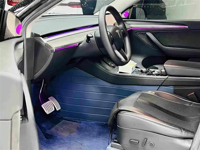 Tesla Model Y — Фото автомобиля 10