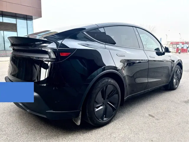 Tesla Model Y — Фото автомобиля 6