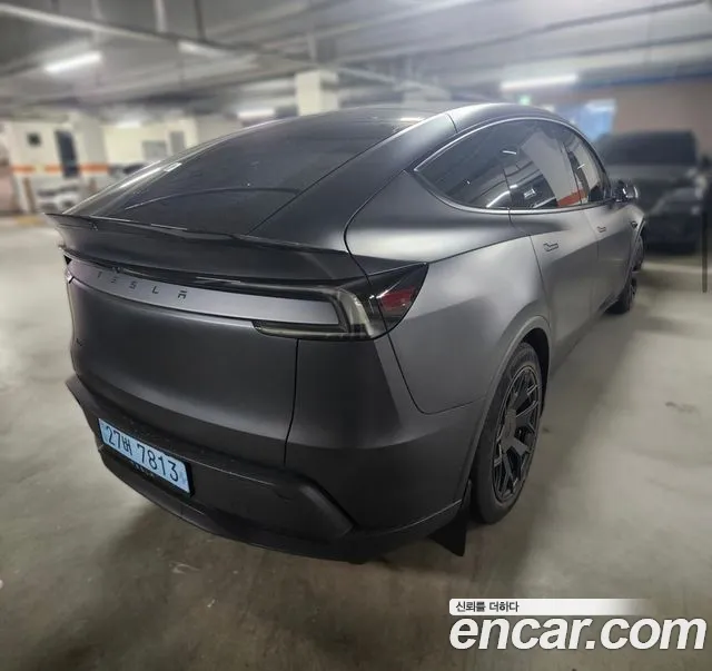 Tesla Model Y — Фото автомобиля 6