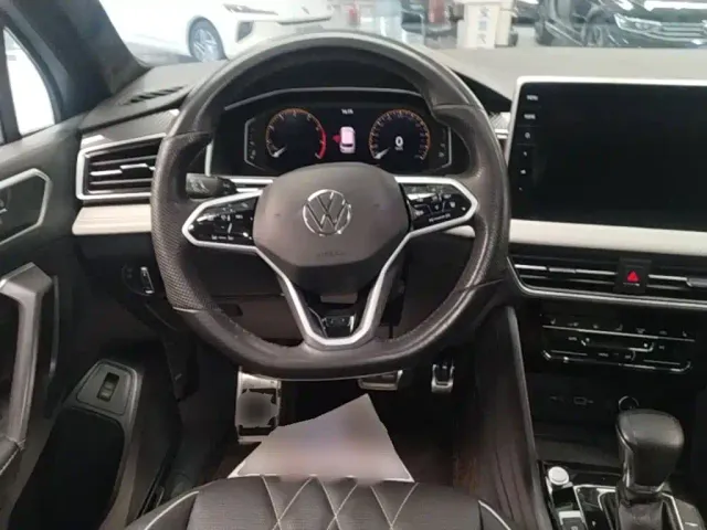 Volkswagen Tiguan L — Фото автомобиля 10