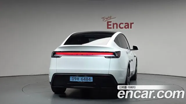 Tesla Model Y — Фото автомобиля 4