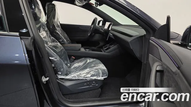 Tesla Model Y — Фото автомобиля 11