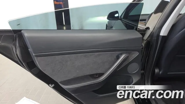 Tesla Model 3 — Фото автомобиля 14