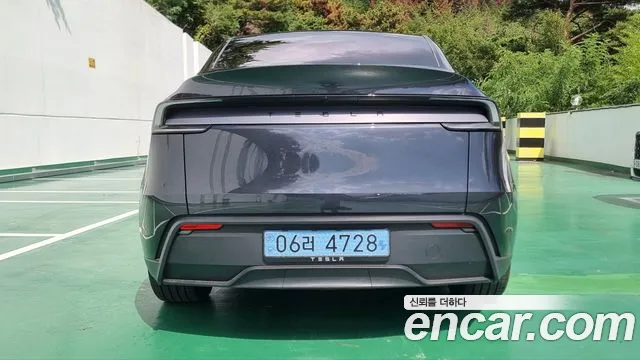 Tesla Model Y — Фото автомобиля 2
