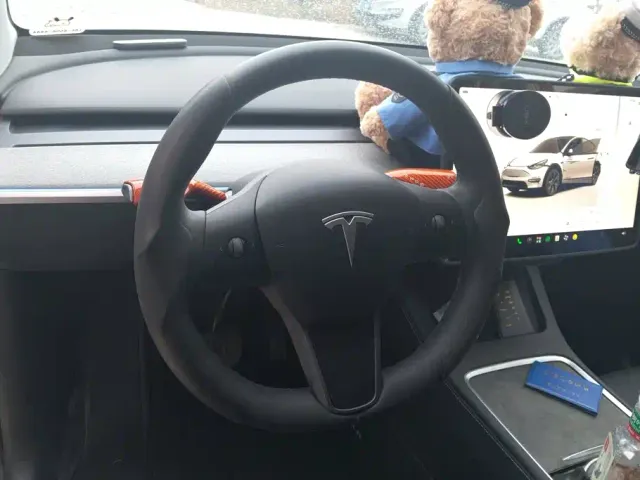 Tesla Model Y — Фото автомобиля 15