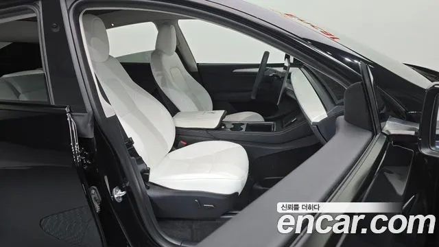 Tesla Model Y — Фото автомобиля 7