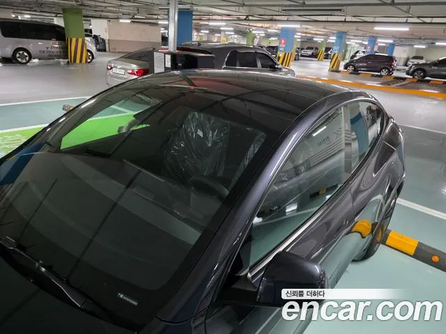Tesla Model Y — Фото автомобиля 7