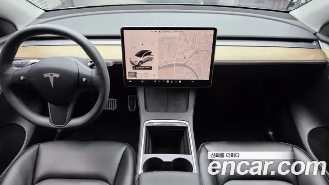 Tesla Model Y — Фото автомобиля 10