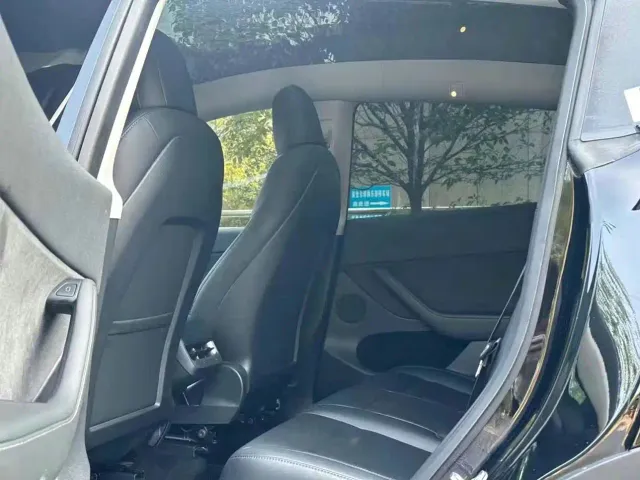 Tesla Model Y — Фото автомобиля 5
