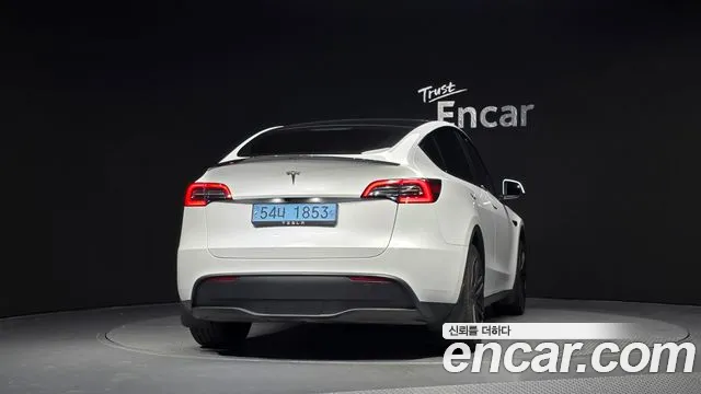 Tesla Model Y — Фото автомобиля 4