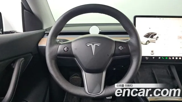 Tesla Model Y — Фото автомобиля 13