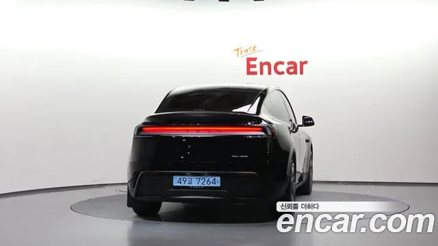 Tesla Model Y — Фото автомобиля 4