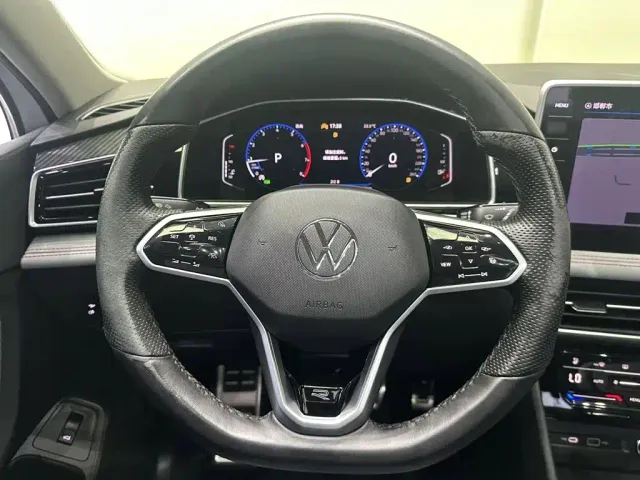 Volkswagen Tiguan L — Фото автомобиля 11