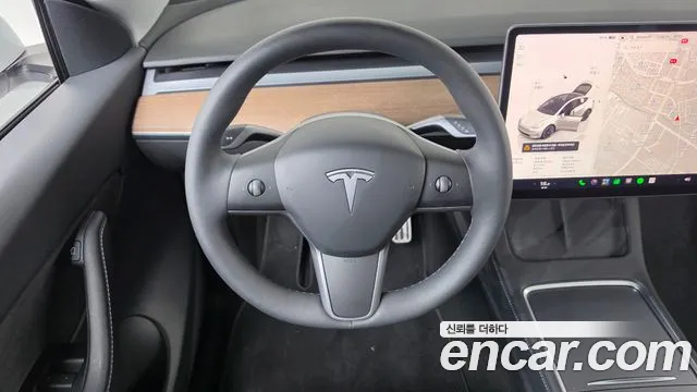 Tesla Model Y — Фото автомобиля 13