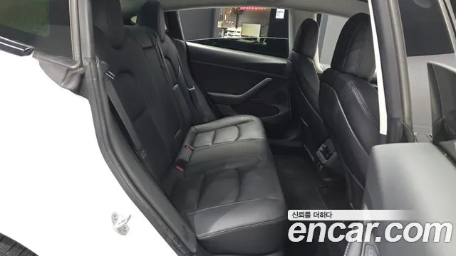 Tesla Model 3 — Фото автомобиля 11
