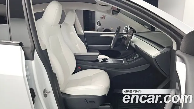 Tesla Model Y — Фото автомобиля 24