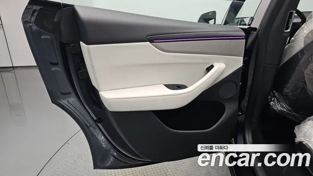 Tesla Model Y — Фото автомобиля 7
