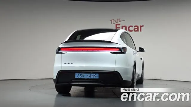 Tesla Model Y — Фото автомобиля 3