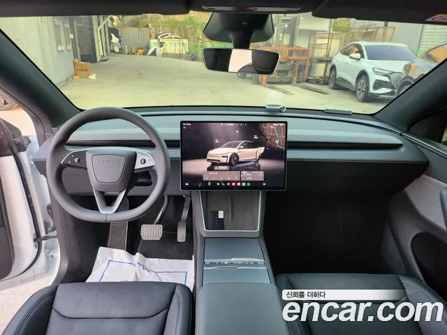 Tesla Model Y — Фото автомобиля 10