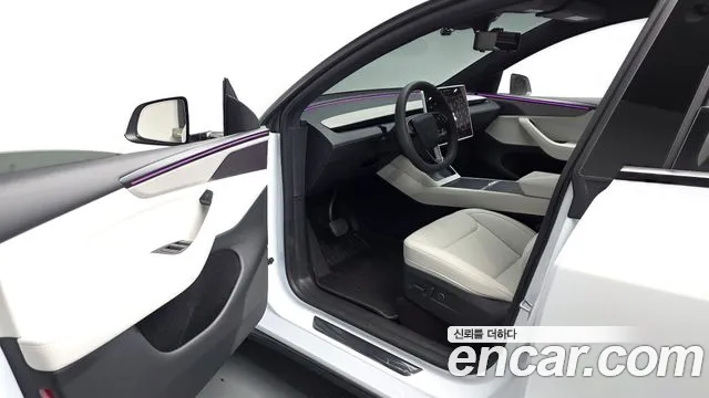 Tesla Model Y — Фото автомобиля 15