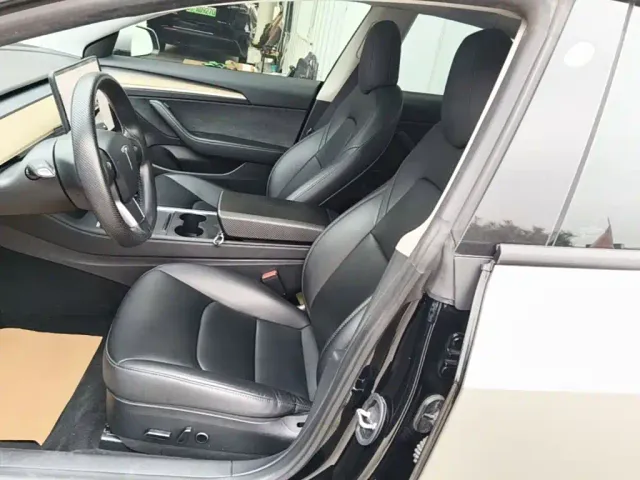 Tesla Model 3 — Фото автомобиля 14