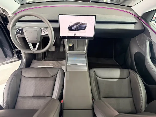Tesla Model Y — Фото автомобиля 9