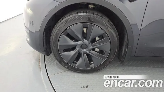 Tesla Model Y — Фото автомобиля 5