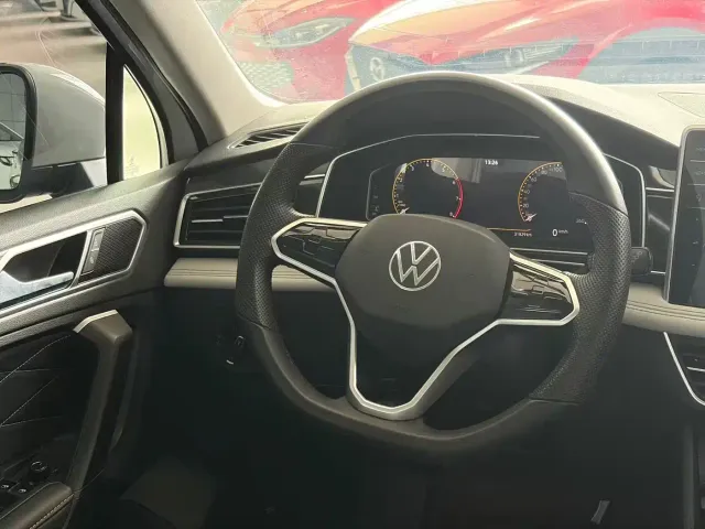 Volkswagen Tiguan L — Фото автомобиля 12