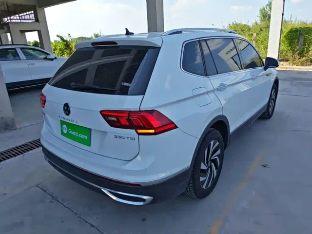 Volkswagen Tiguan L — Фото автомобиля 6