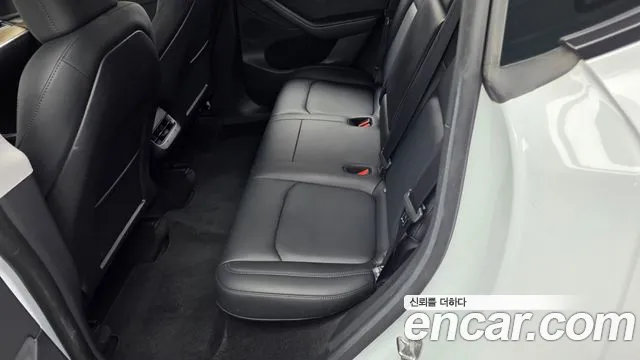 Tesla Model Y — Фото автомобиля 16