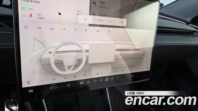 Tesla Model Y — Фото автомобиля 22