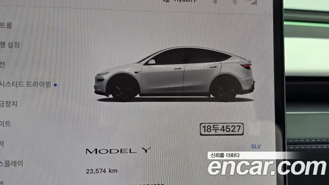 Tesla Model Y — Фото автомобиля 11