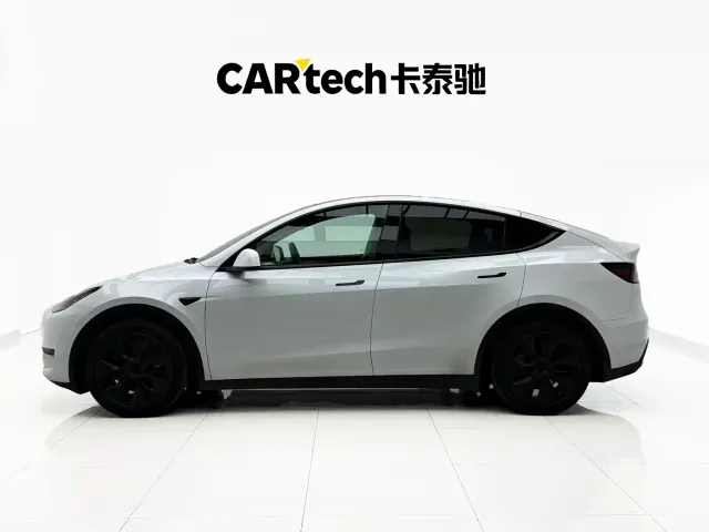 Tesla Model Y — Фото автомобиля 4
