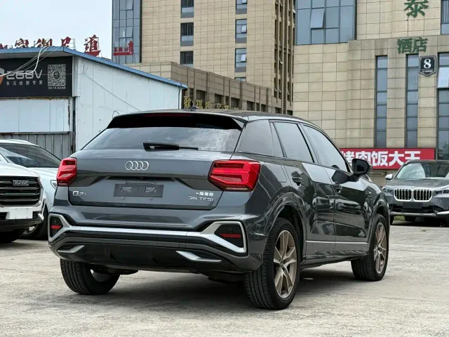 Audi Q2L — Фото автомобиля 9
