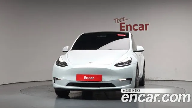 Tesla Model Y — Фото автомобиля 2