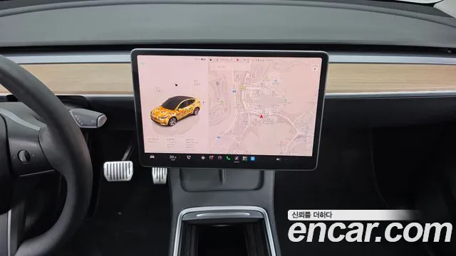 Tesla Model Y — Фото автомобиля 13