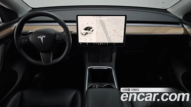 Tesla Model Y — Фото автомобиля 7