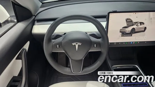 Tesla Model Y — Фото автомобиля 9