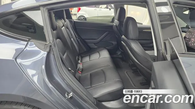 Tesla Model 3 — Фото автомобиля 11