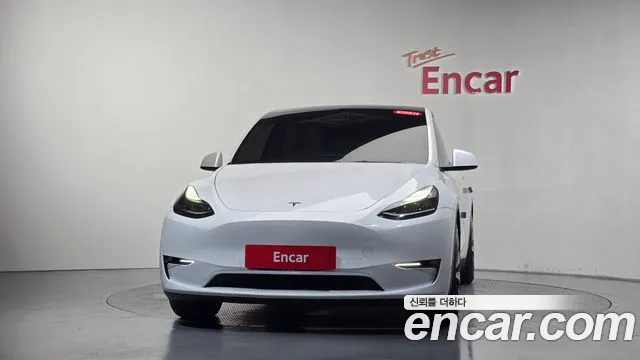 Tesla Model Y — Фото автомобиля 3