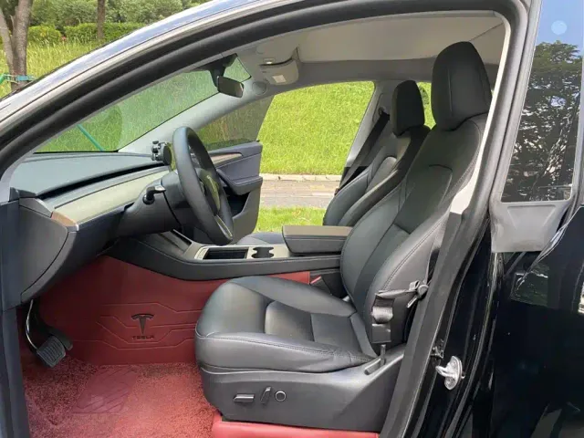 Tesla Model Y — Фото автомобиля 11