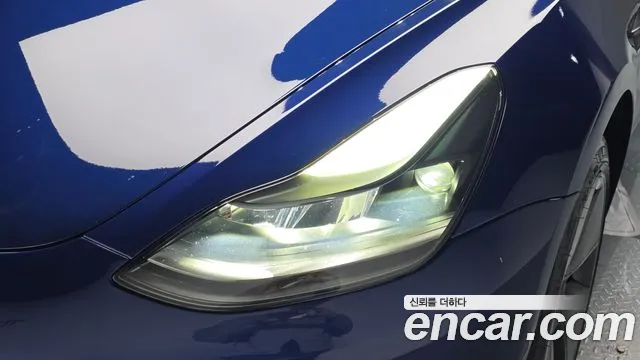 Tesla Model 3 — Фото автомобиля 7